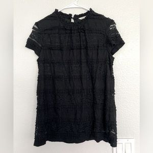 4/$25 Black frilly blouse by Zac and Rachel. Small